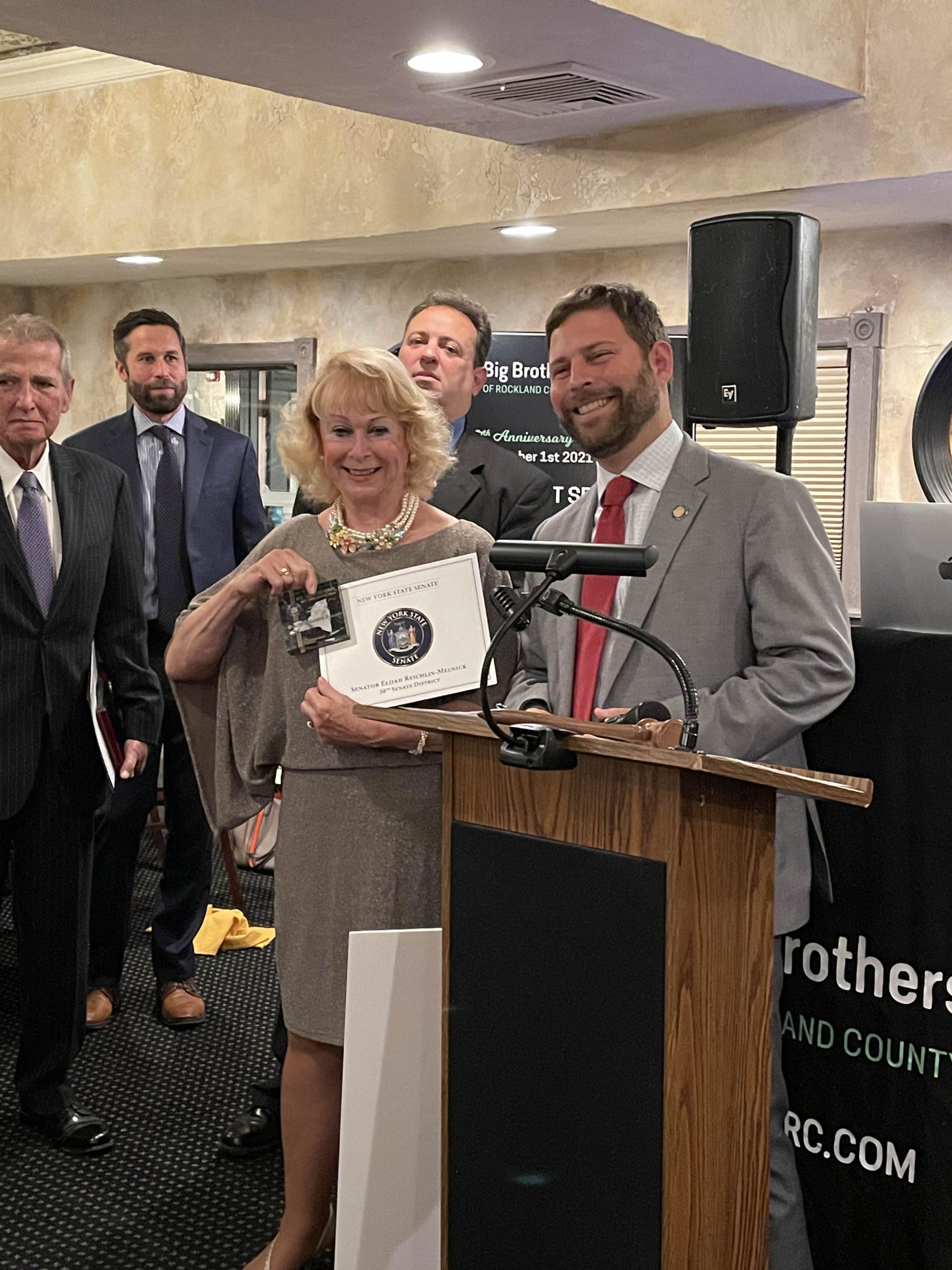 Senator Elijah Reichlin-Melnick delivers state funding, commendation award for Big Brothers Big Sisters