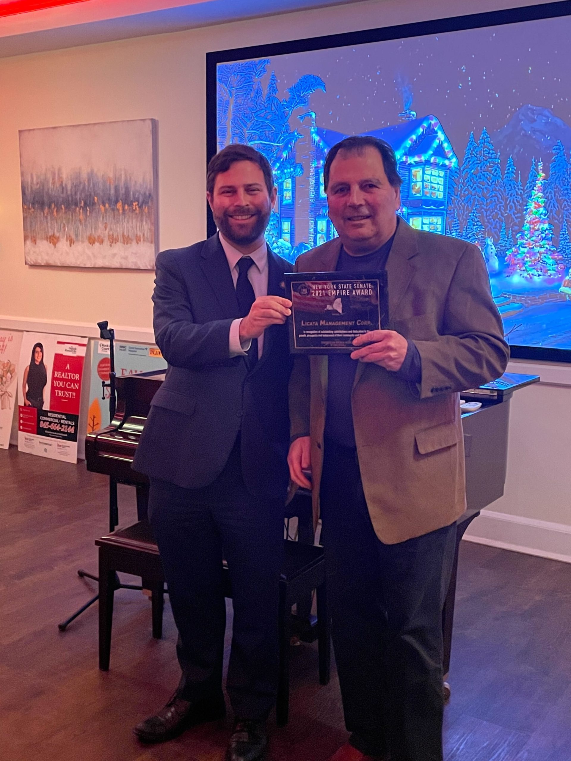 Senator Elijah Reichlin-Melnick presents local business with Empire Award at Suffern Chamber of Commerce Gala