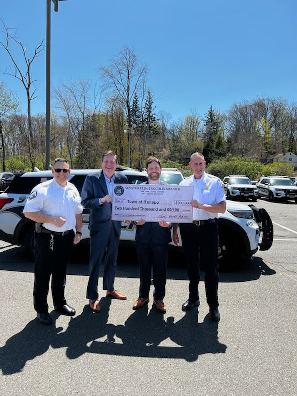 Ramapo’s Specht accepts check from Reichlin-Melnick