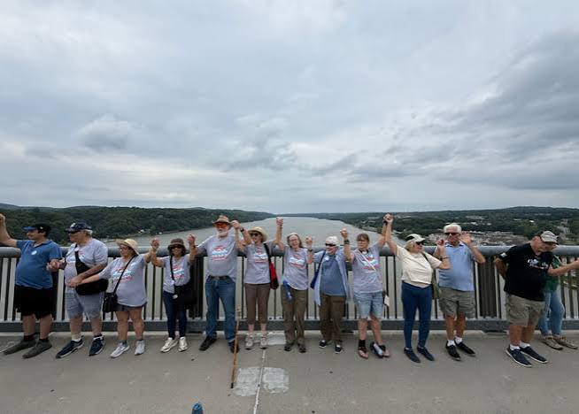 Hundreds Gather for Walkway Demonstration
